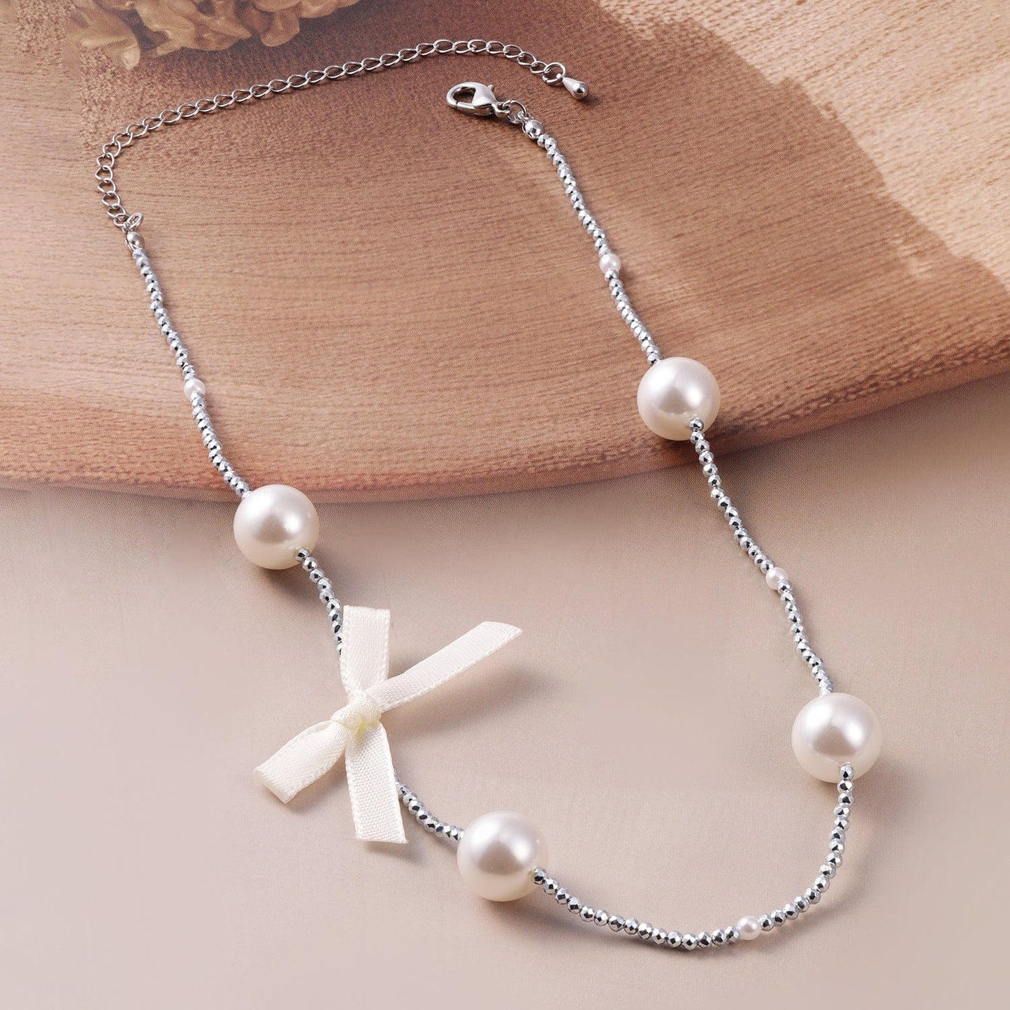 Rhodium-Plated Chain Necklace with Faux Pearls and Fabric Ribbon Bow Accent