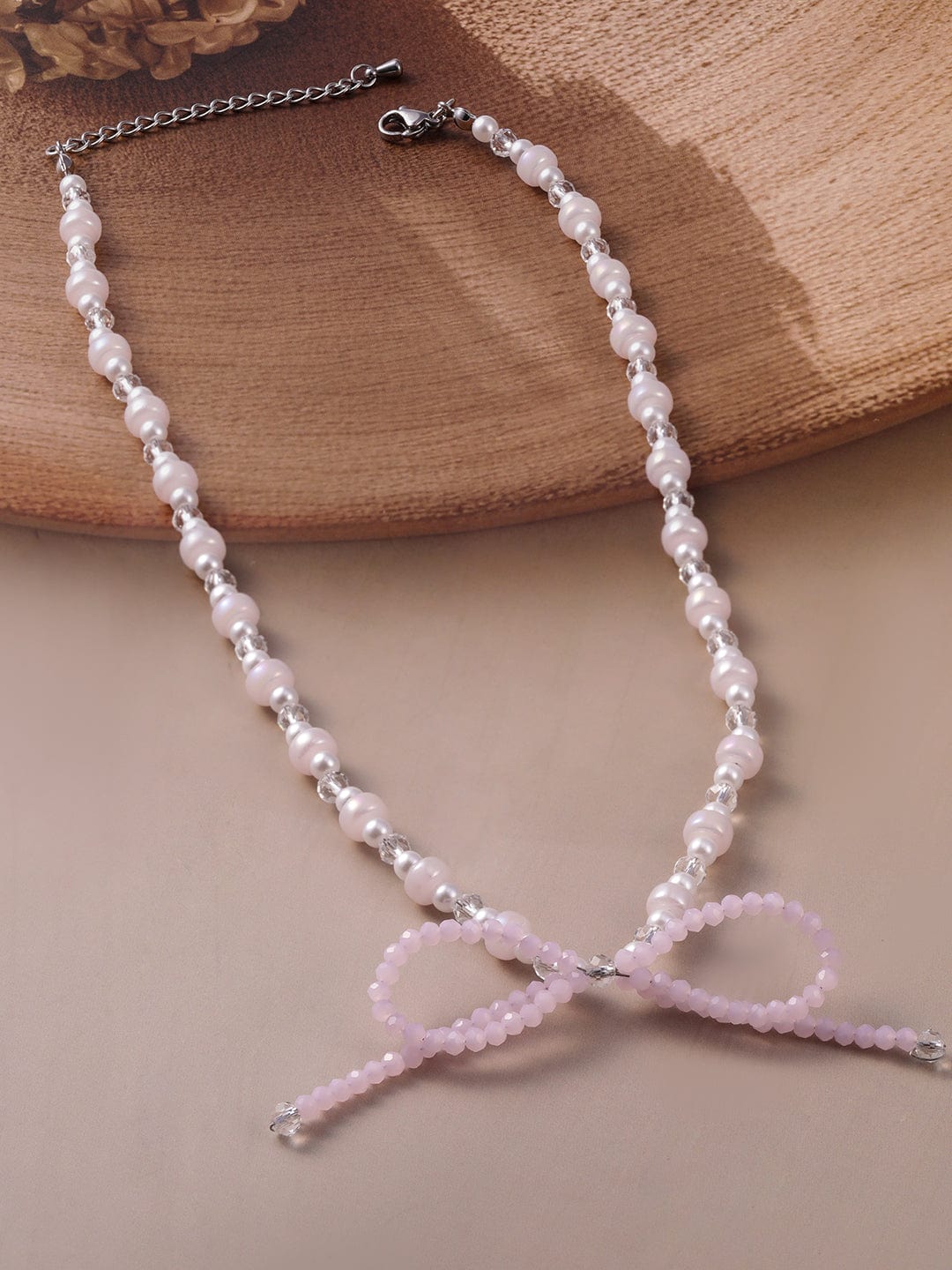 Rubans Rhodium Plated Pearl Beaded Necklace with Soft Pink Bow Charm