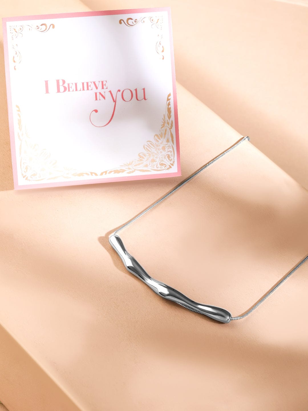 Rubans Voguish Silver Plated Stainless Steel Tarnish-Free Waterproof Sculptural Pendant Necklace