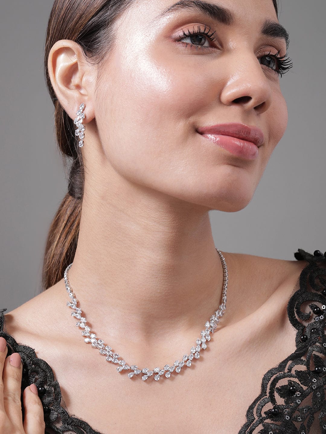 Rhodium Plated AD & Cubic Zirconia Studded Luxurious Floral Motif Necklace Set
