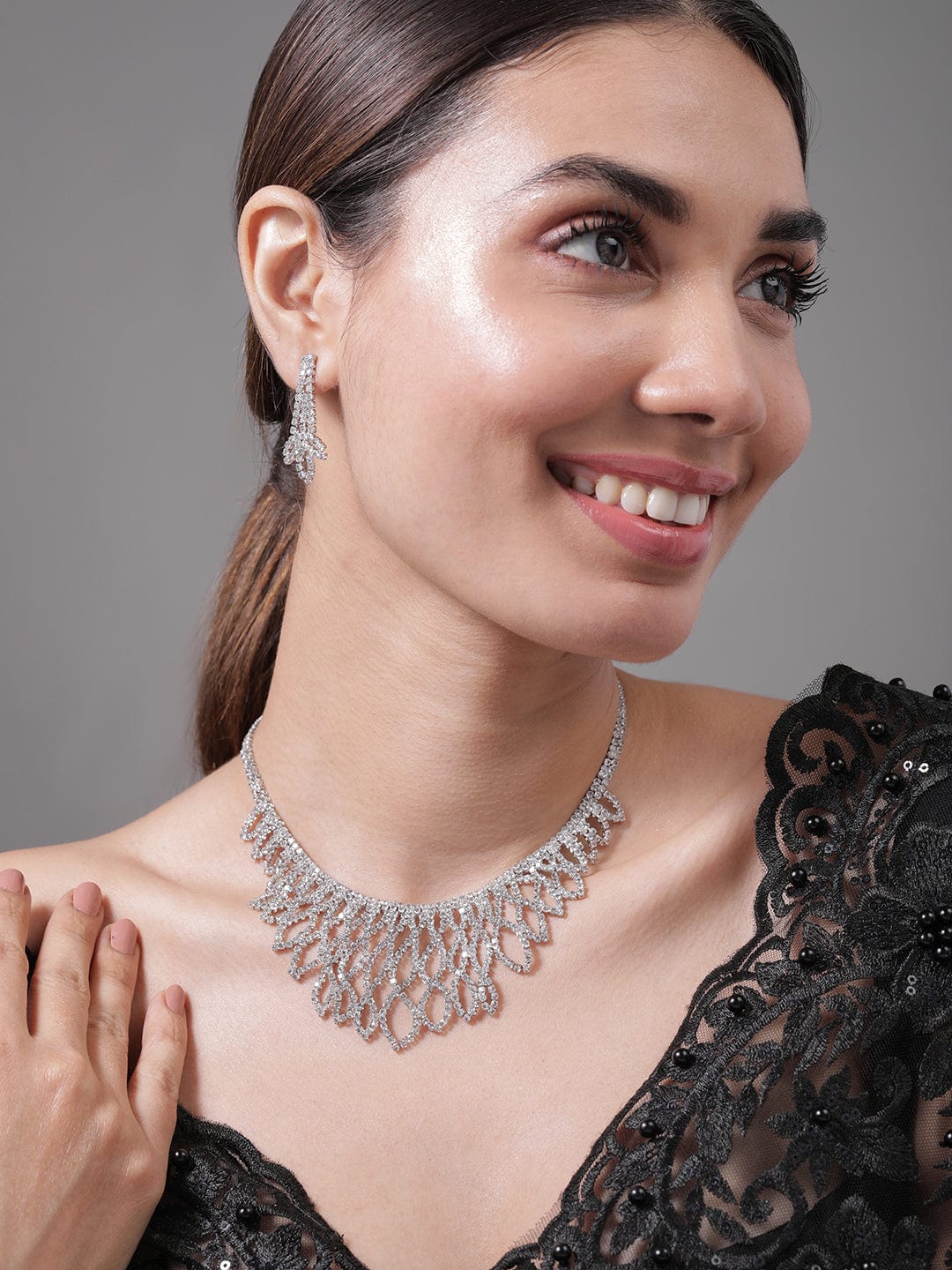 Rhodium Plated AD & Cubic Zirconia Studded Luxurious Leaf Motif Necklace Set