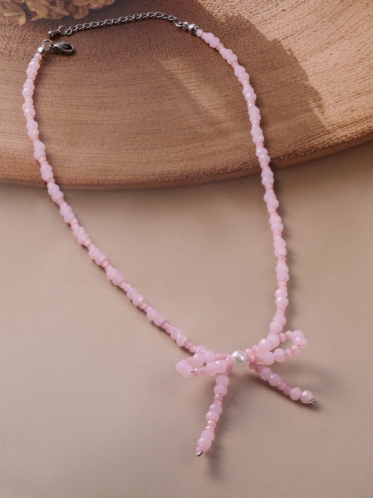 Rhodium Plated Pink Bead Necklace with Bow Pendant