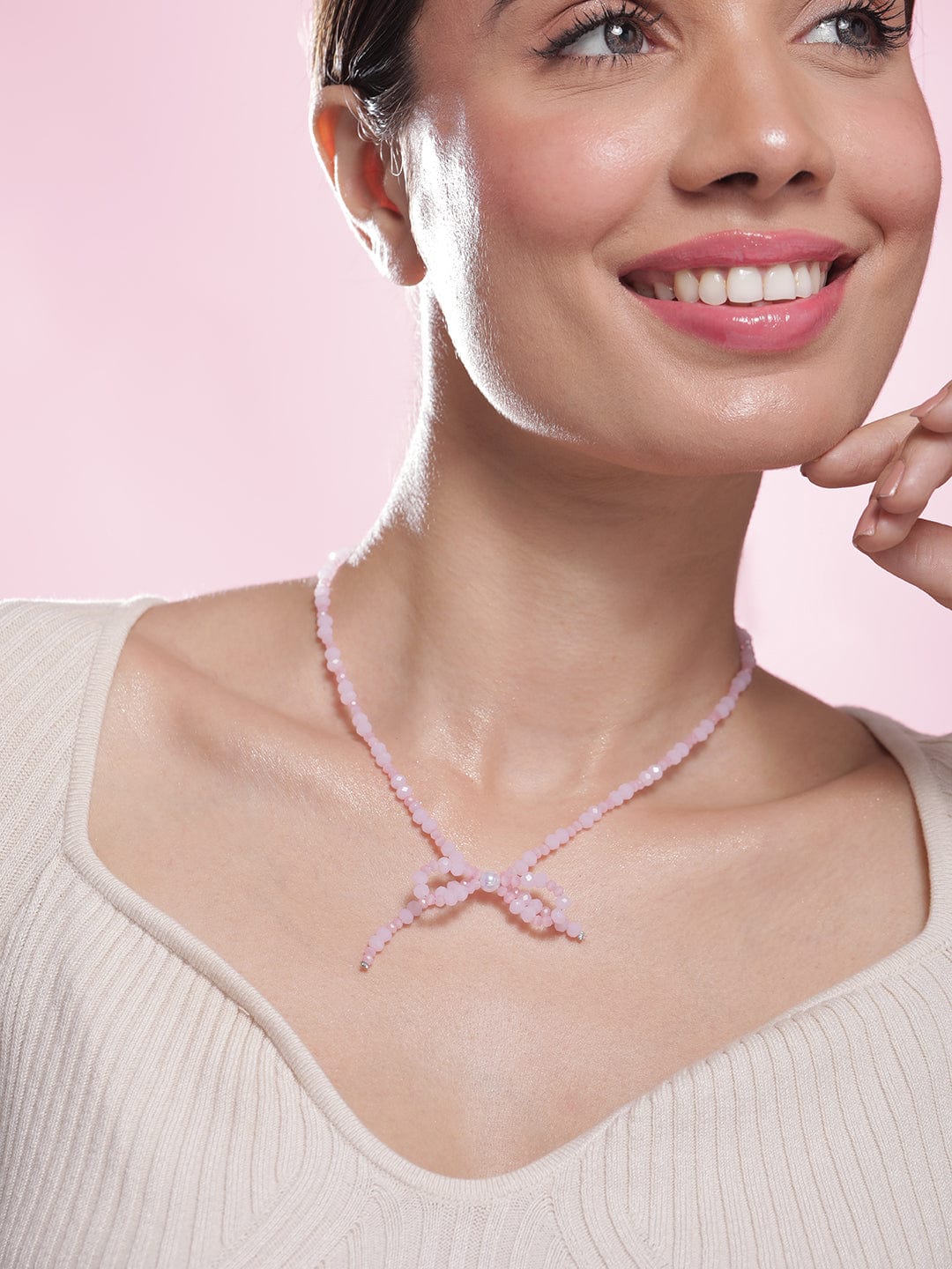 Rhodium Plated Pink Bead Necklace with Bow Pendant