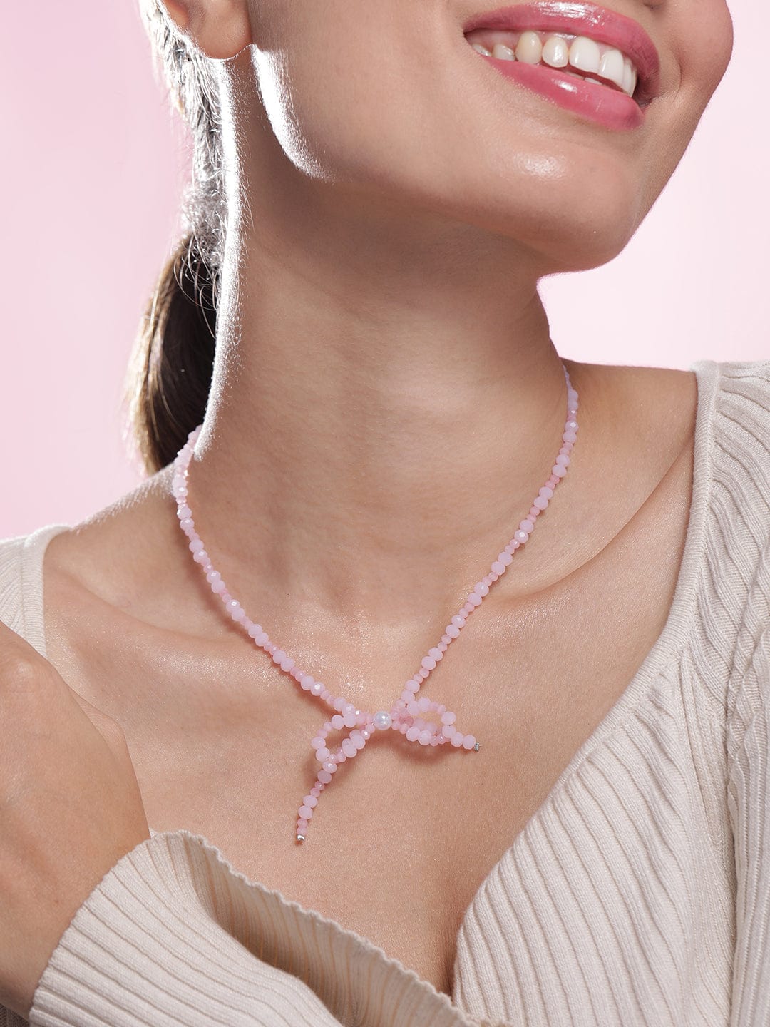 Rhodium Plated Pink Bead Necklace with Bow Pendant