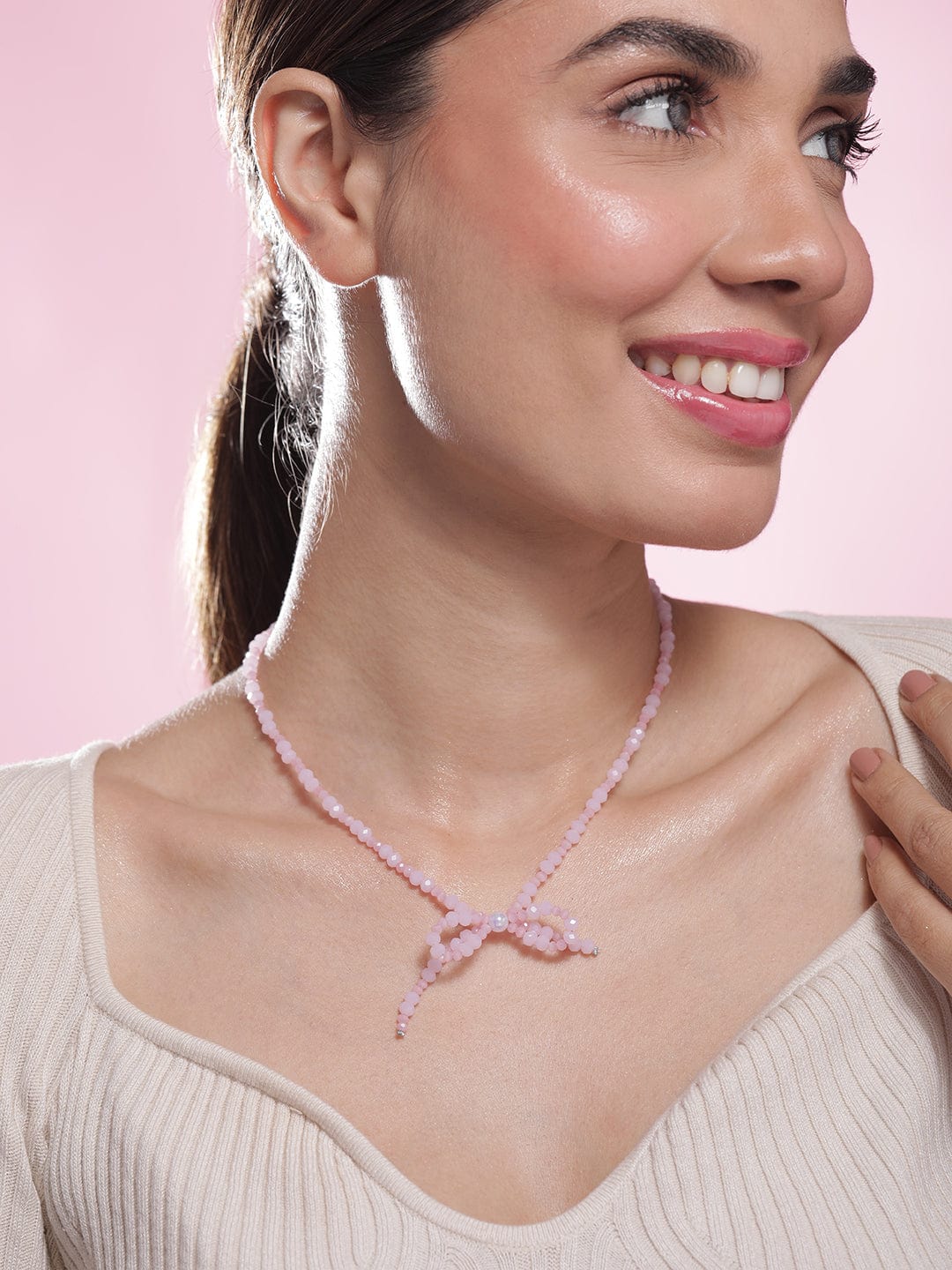 Rhodium Plated Pink Bead Necklace with Bow Pendant
