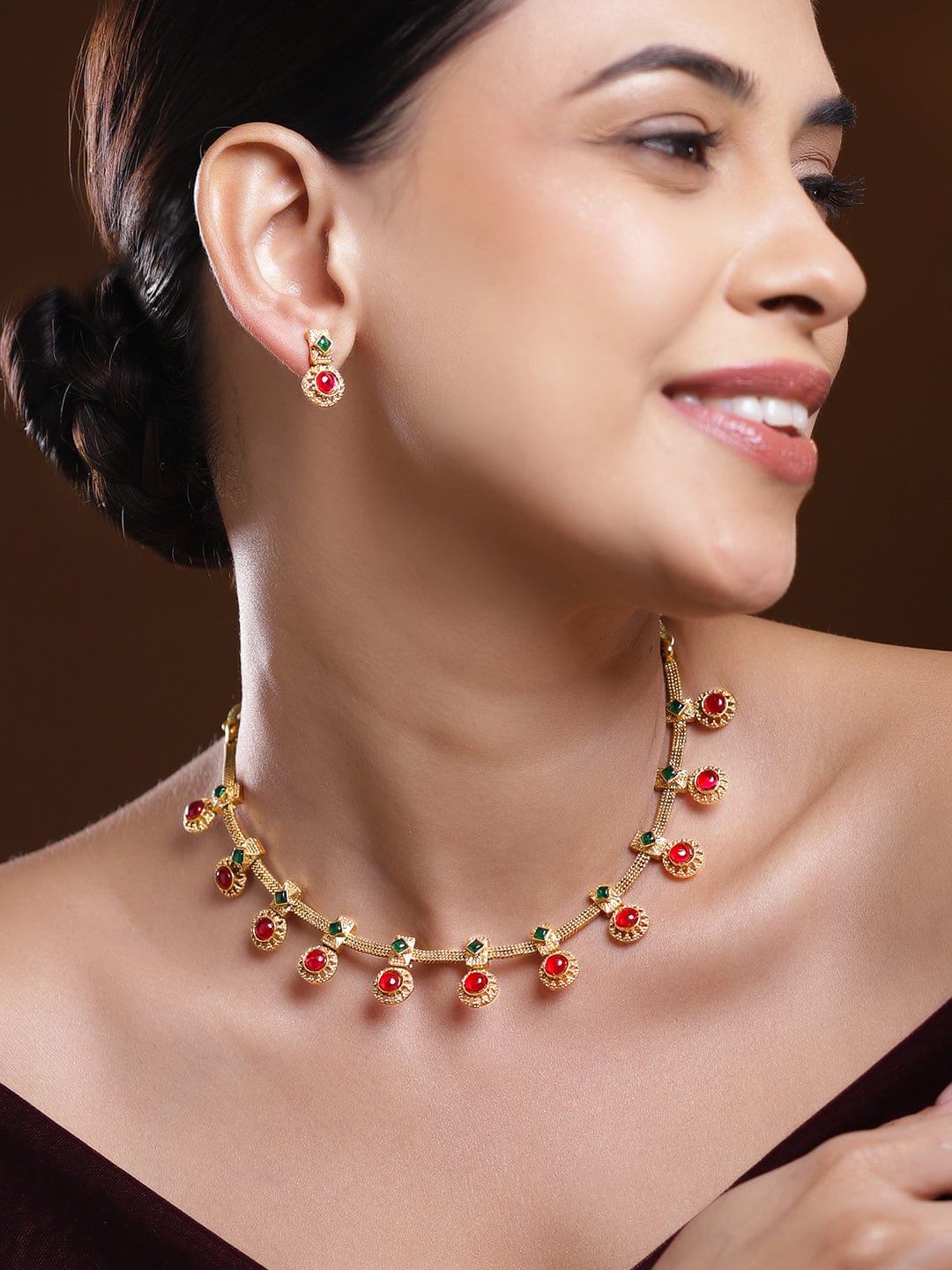 Rubans 22K Gold-Plated Green & Ruby Red Stone Studded Traditional Necklace Set with Textured Drop Accents
