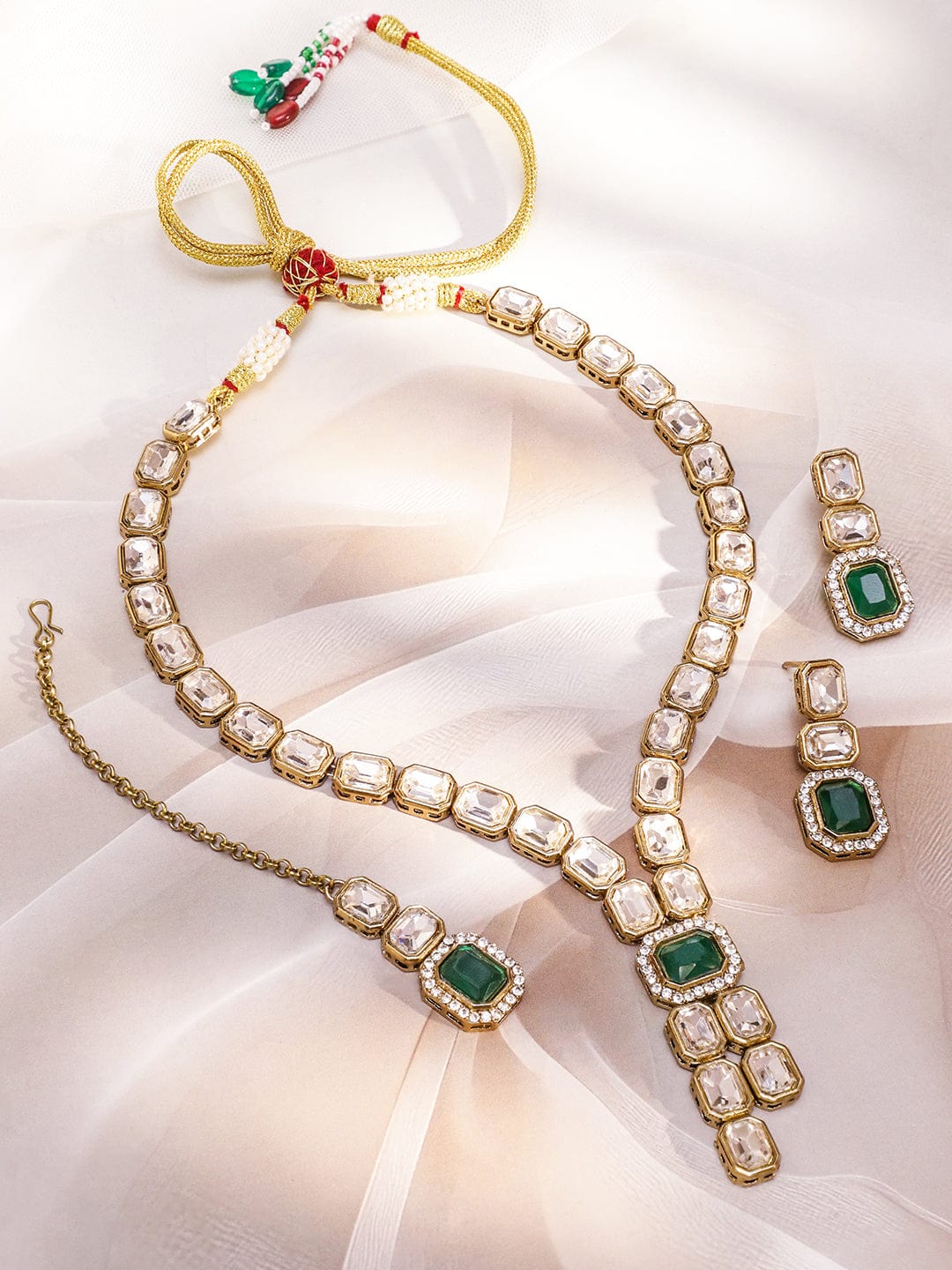 Rubans 22K Gold-Plated White Kundan Studded V-Shaped Necklace Set with Emerald Green Center Stone