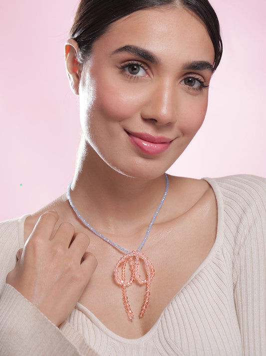 Rubans Rhodium Plated Blue Beaded Necklace with Pink Crystal Bow Pendant