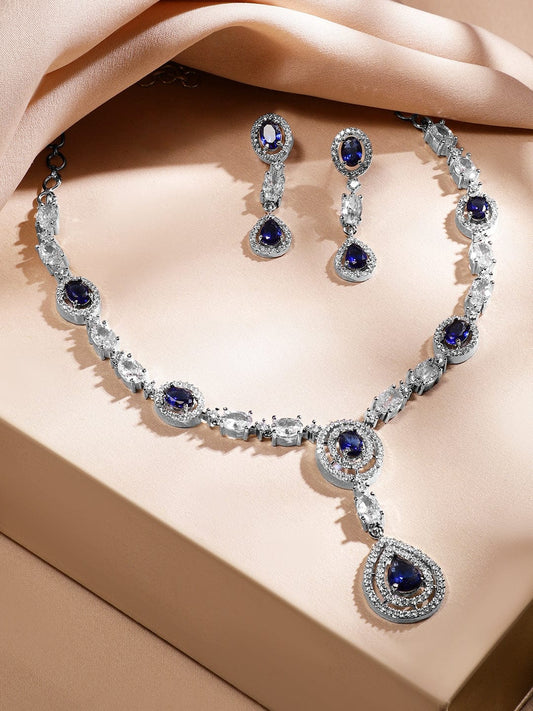 Rubans Rhodium-Plated Blue Sapphire & AAA Cubic Zirconia Studded Halo & Teardrop Design Luxe Necklace Set in Silver Tone for Women