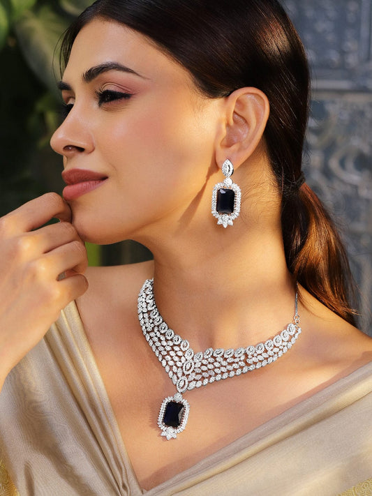 Rubans Rhodium-Plated Blue Sapphire & White Cubic Zirconia Studded Luxe V-Shaped Statement Necklace Set