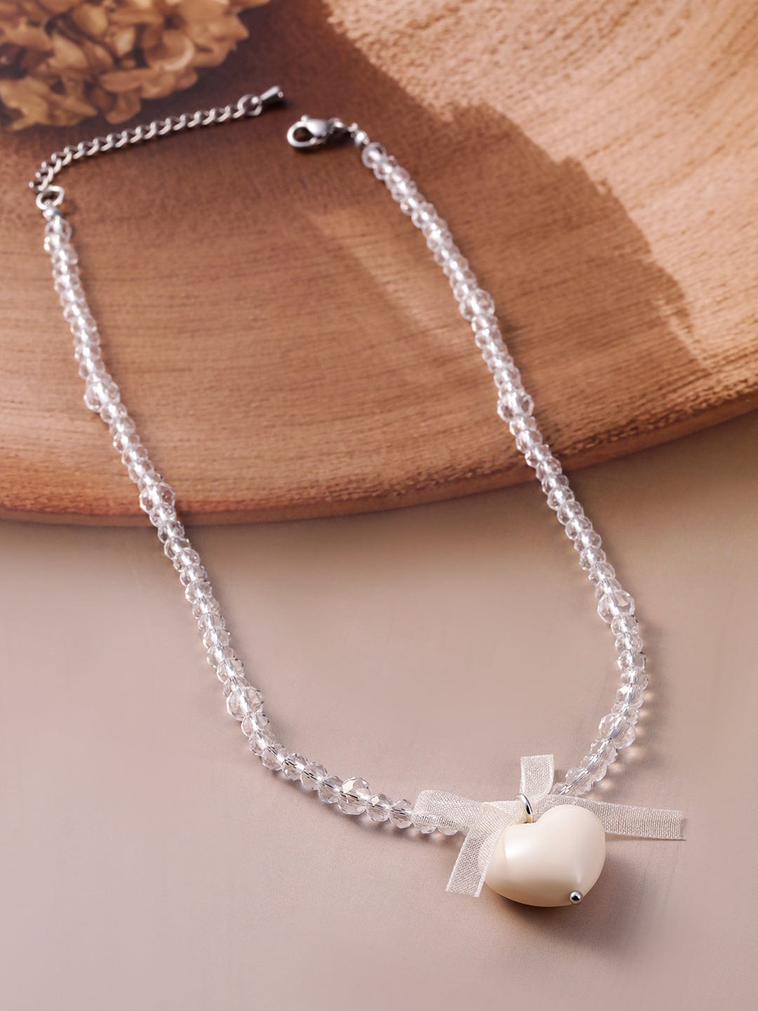 Rubans Rhodium Plated Crystal Beaded Necklace with Heart Pendant and Bow Detailing
