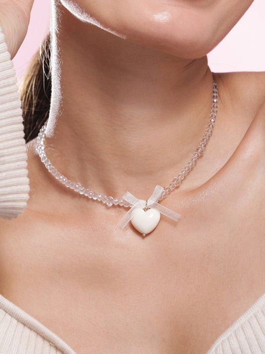 Rubans Rhodium Plated Crystal Beaded Necklace with Heart Pendant and Bow Detailing