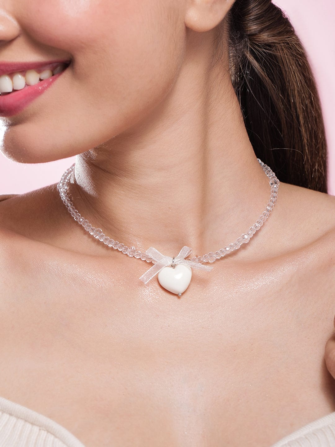 Rubans Rhodium Plated Crystal Beaded Necklace with Heart Pendant and Bow Detailing