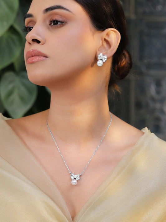 Rubans Rhodium-Plated Pearl and Crystal Bow Pendant Necklace and Earrings