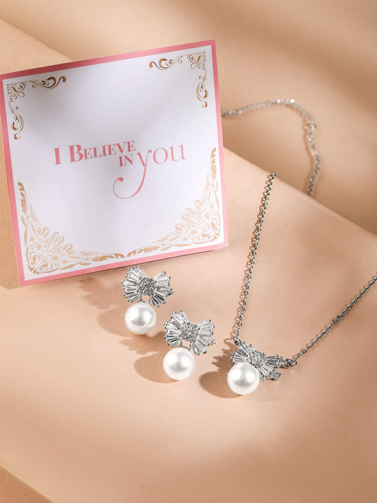 Rubans Rhodium-Plated Pearl and Crystal Bow Pendant Necklace and Earrings