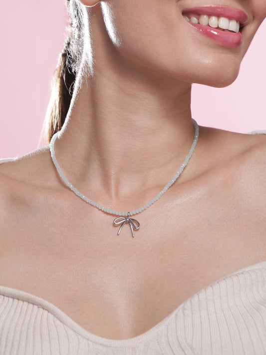 Rubans Rhodium Plated Minimalist White Beaded Necklace with Silver Bow Charm
