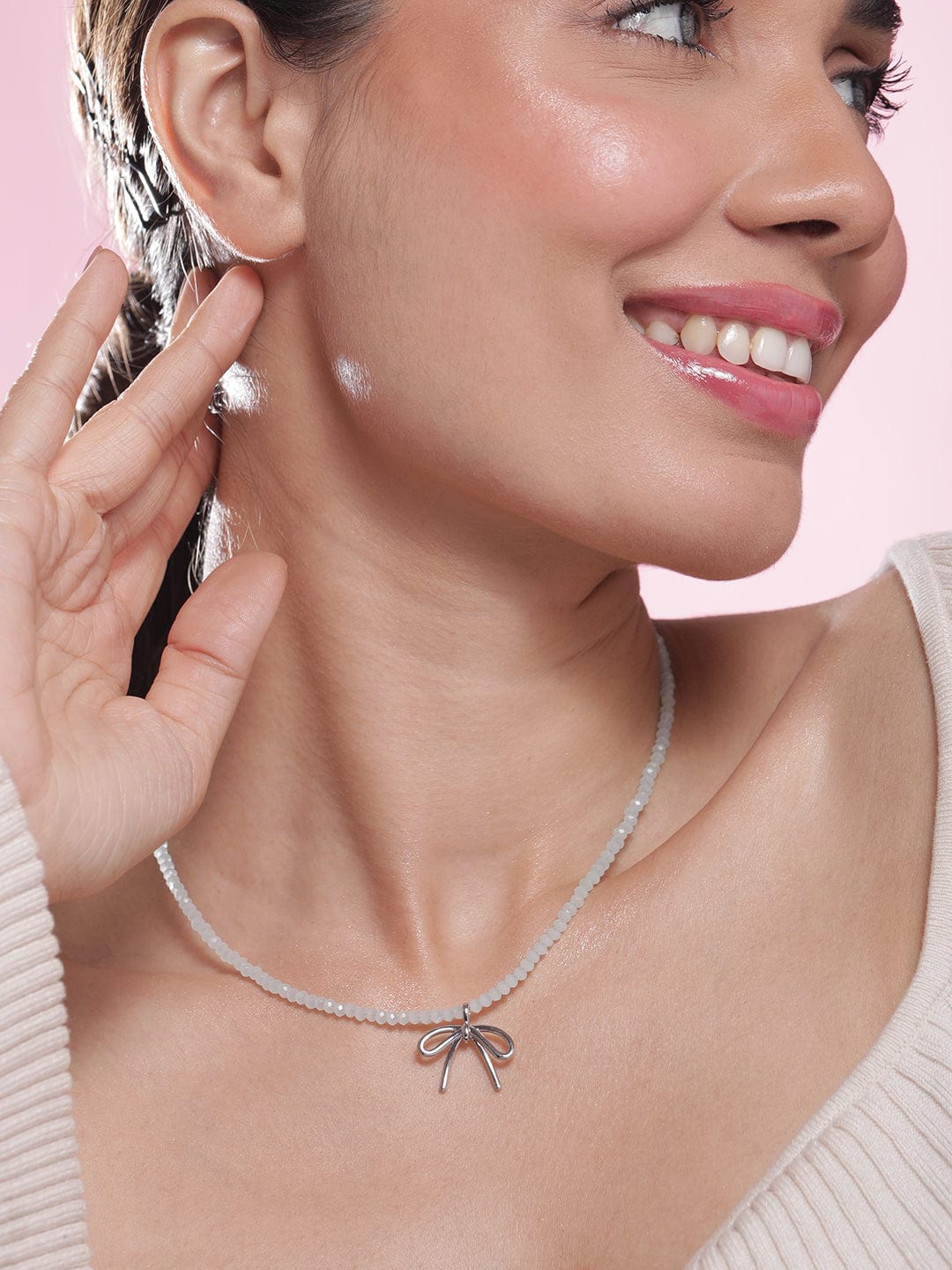 Rubans Rhodium Plated Minimalist White Beaded Necklace with Silver Bow Charm