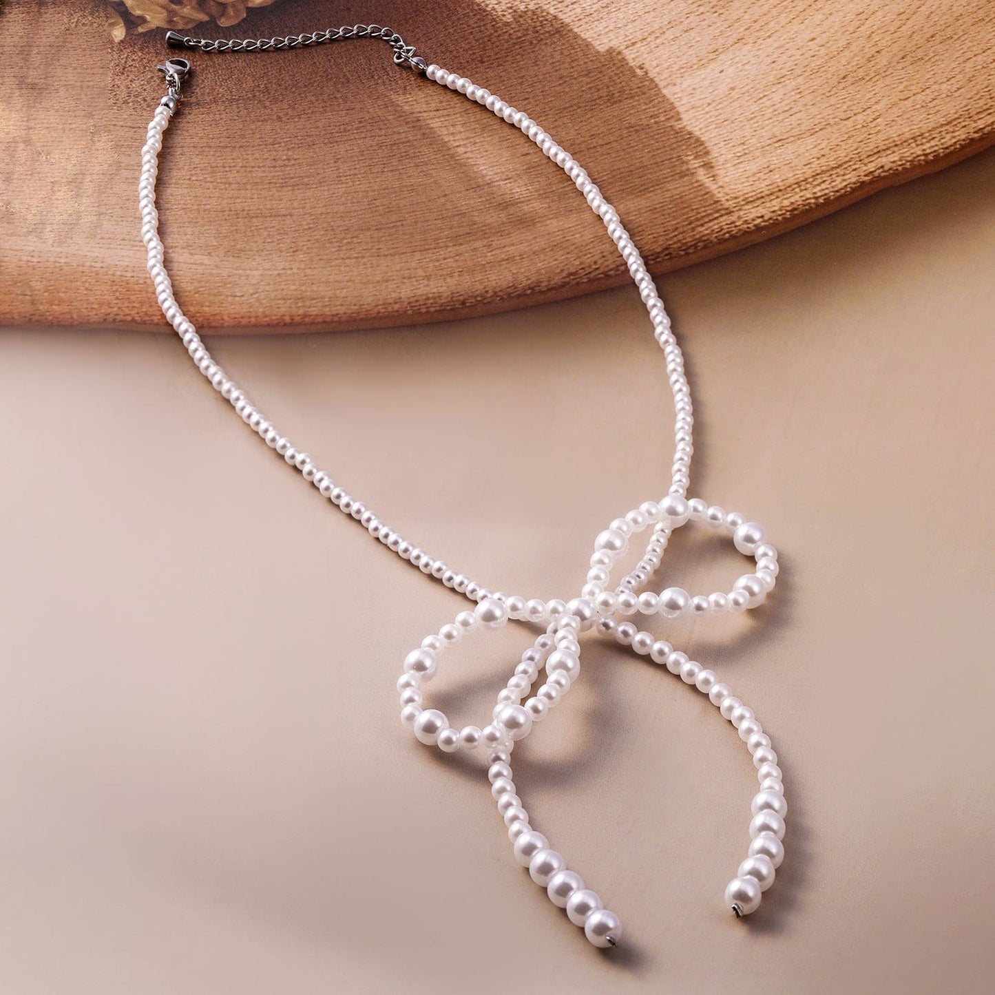 White Pearl Bow Necklace with Silver-Plated Clasp